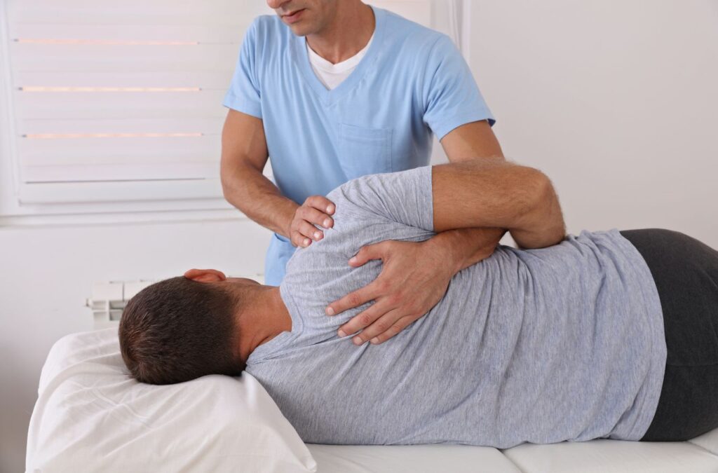 Why Choose Chiropractic Services in Bedford Hills, VA by Hill City Chiropractic - Our chiropractor explaining treatment benefits to a patient, ensuring top-notch care, chiropractic services near me.