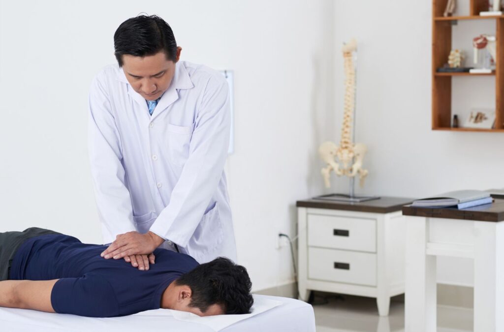 Why Choose Chiropractic Services in Wildwood, VA by Hill City Chiropractic - Our chiropractor explaining treatment benefits to a patient, ensuring top-notch care, chiropractic services near me.